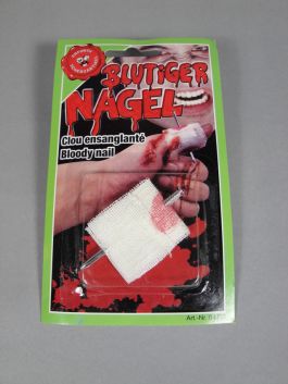 Pireced finger, plastic nail on card